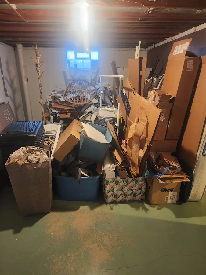 Roll-off dumpster container at job site for 6 Yard Dumpster Rental in Howell